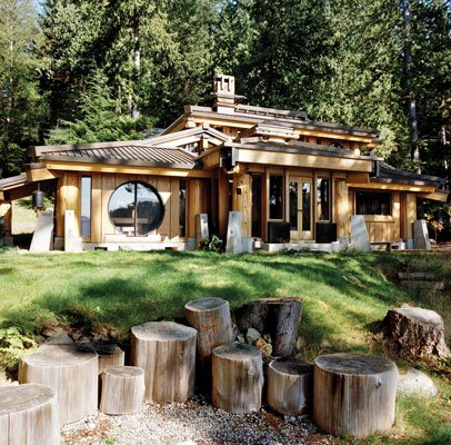 The house nestles into the trees on Gambier Island. "It is intrinsically now a part of the site, such that it's difficult to think of the site without the home or the home without the site," says architect Henry Yorke Mann.